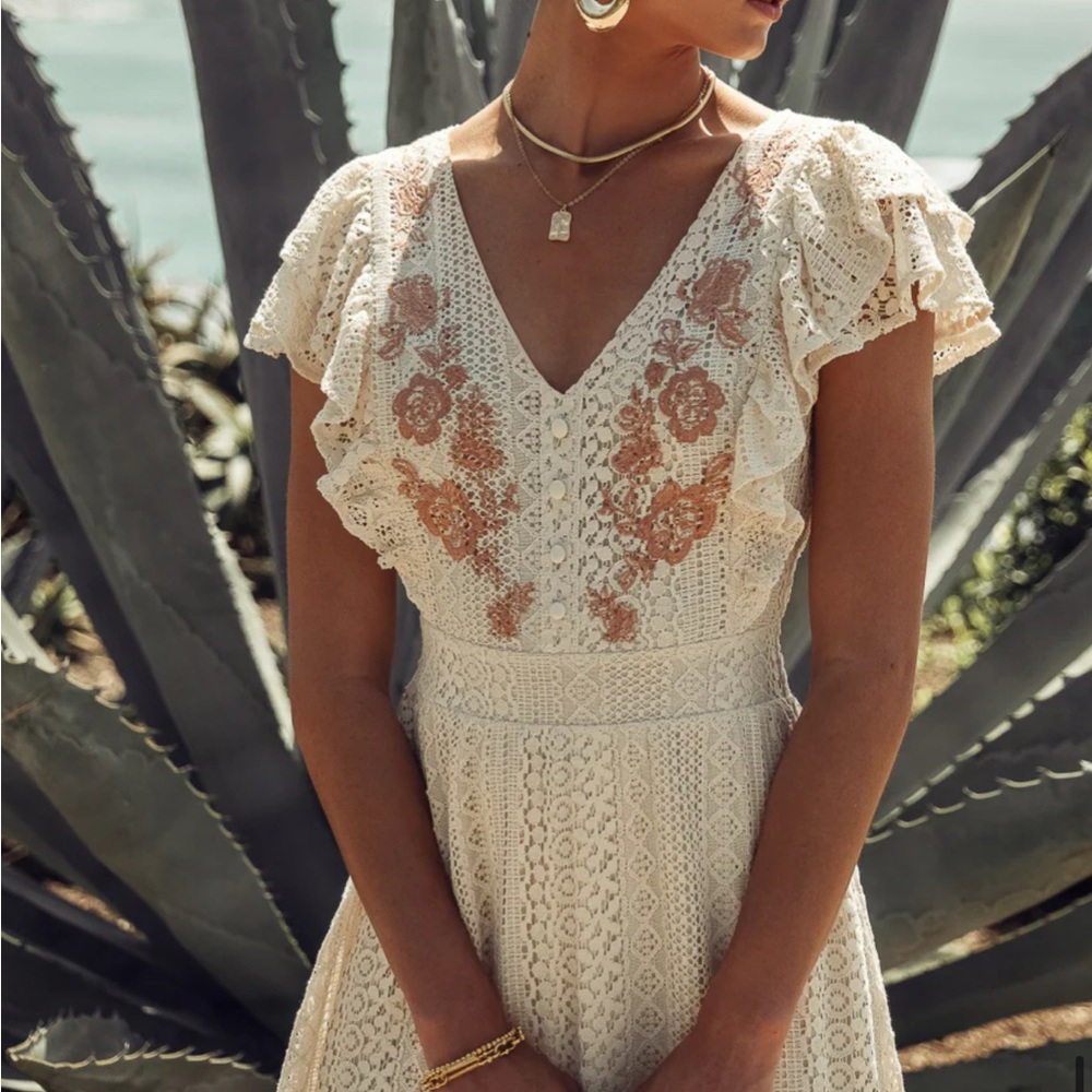 Elegant Cream Lace Dress with Floral Accents